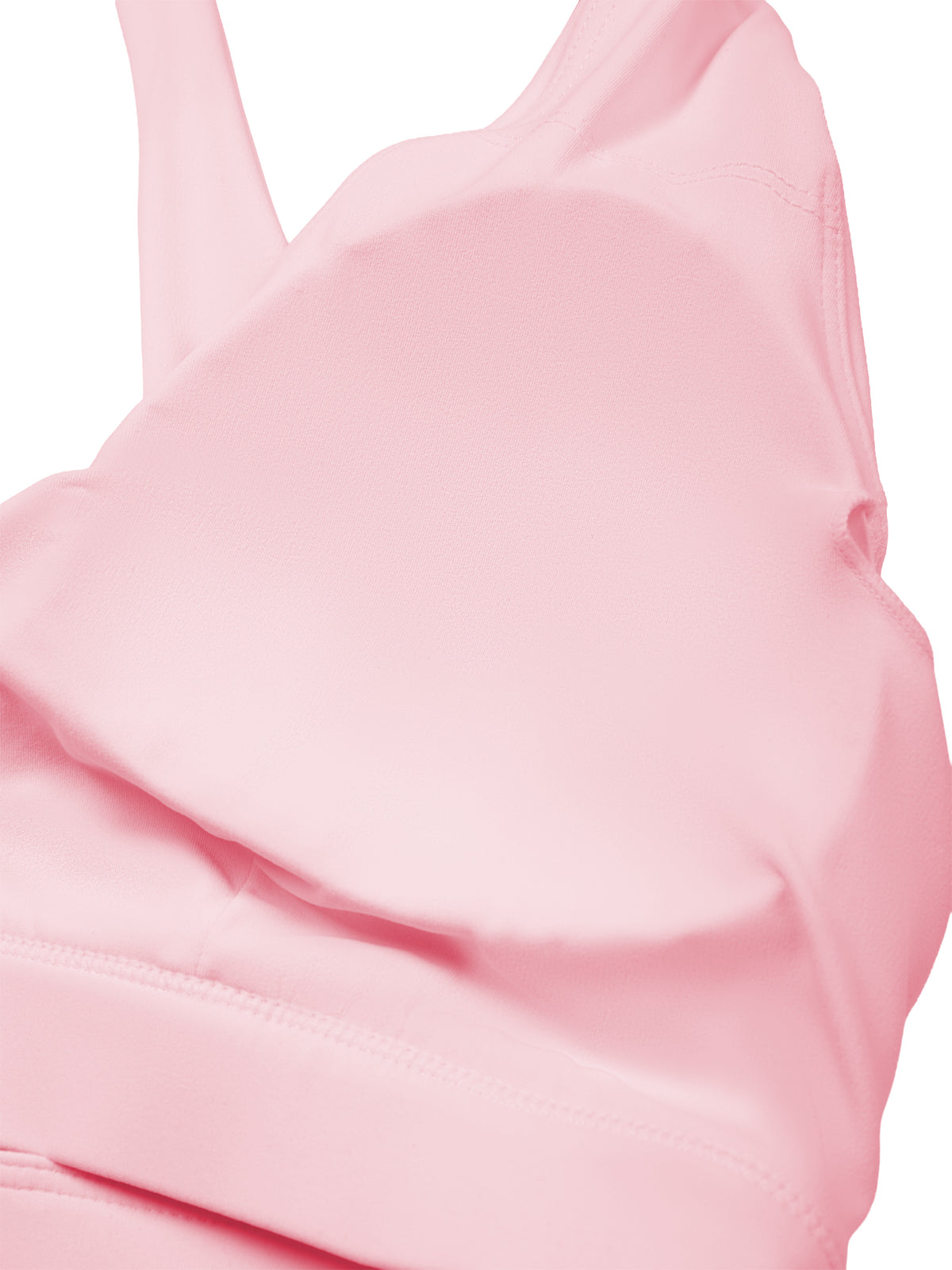 Close-up of a light pink sports bra or bralette showing the smooth fabric and underband against a white background.