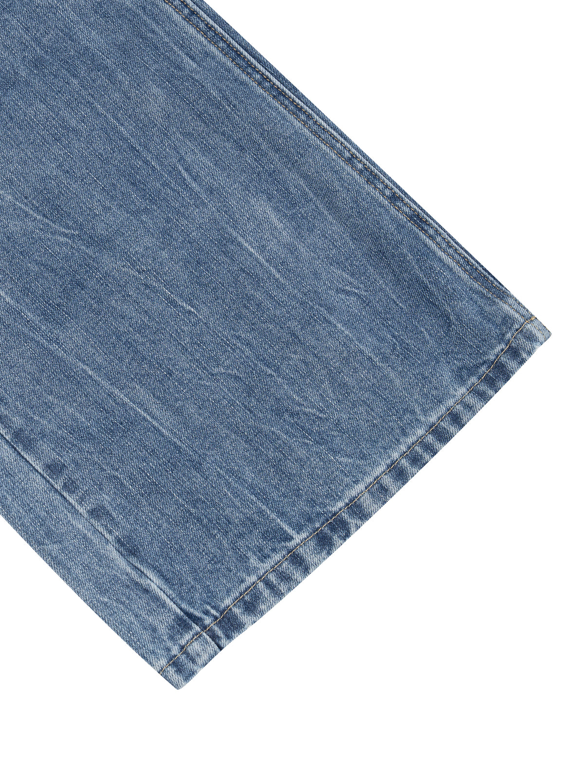 A close-up detail shot of a light blue denim fabric, showing the texture and hem of a garment, isolated on a white background.