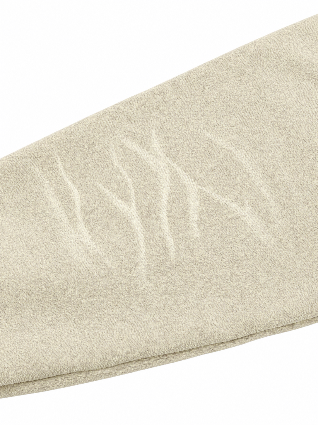 A close-up of a light beige fabric surface with a subtle tonal wavy pattern, shown against a plain white background.