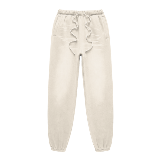 Beige sweatpants with ruffled details on a white background