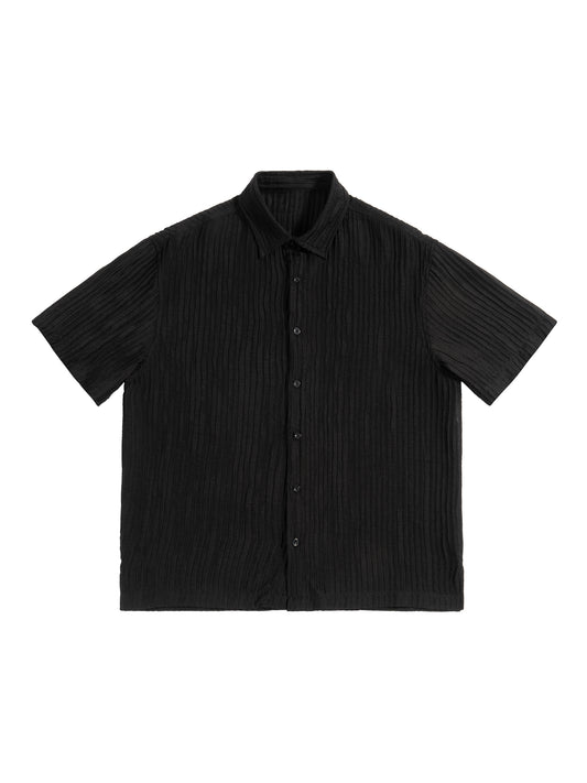 Black short-sleeve shirt on a white background