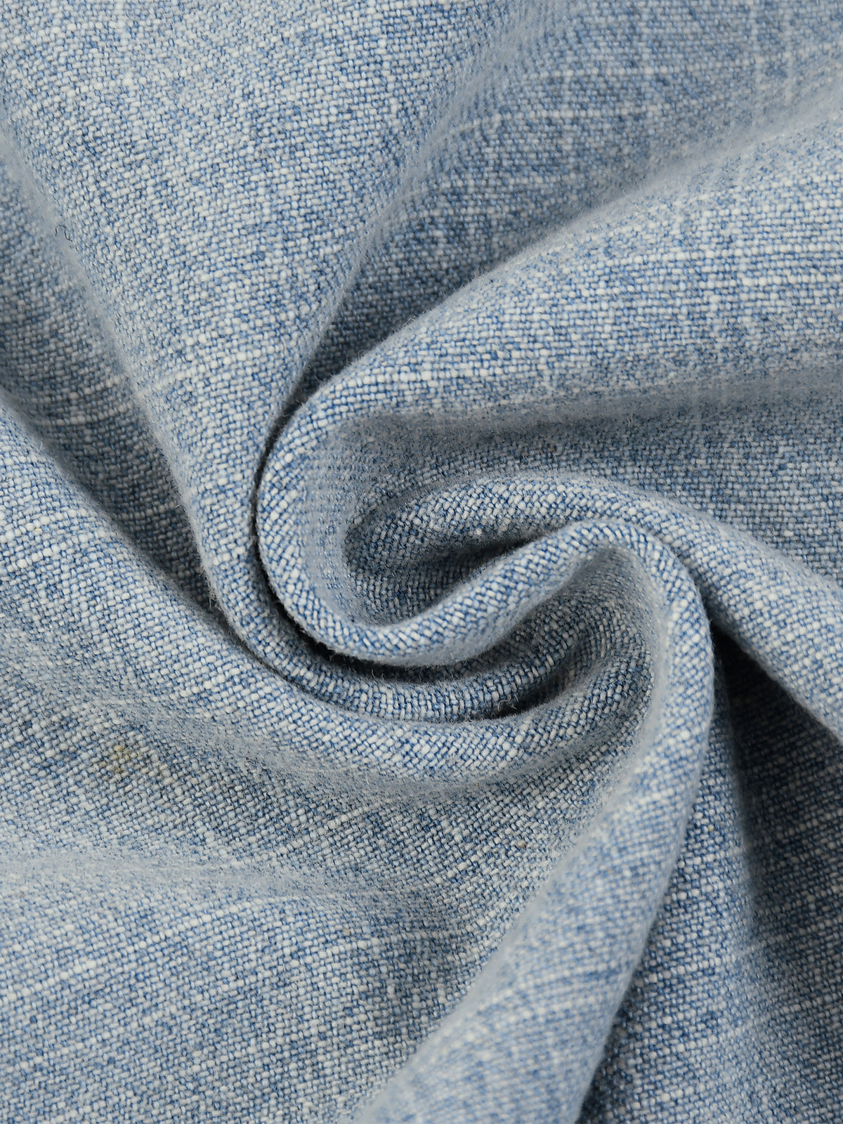 Close-up of textured blue fabric with folds