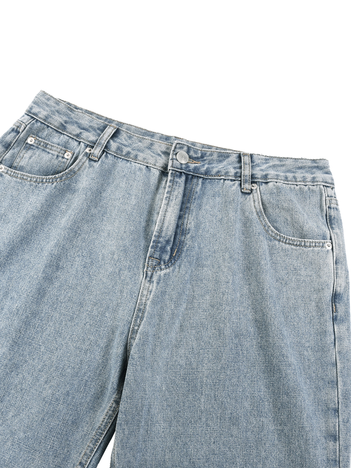 Light blue denim jeans on a white background