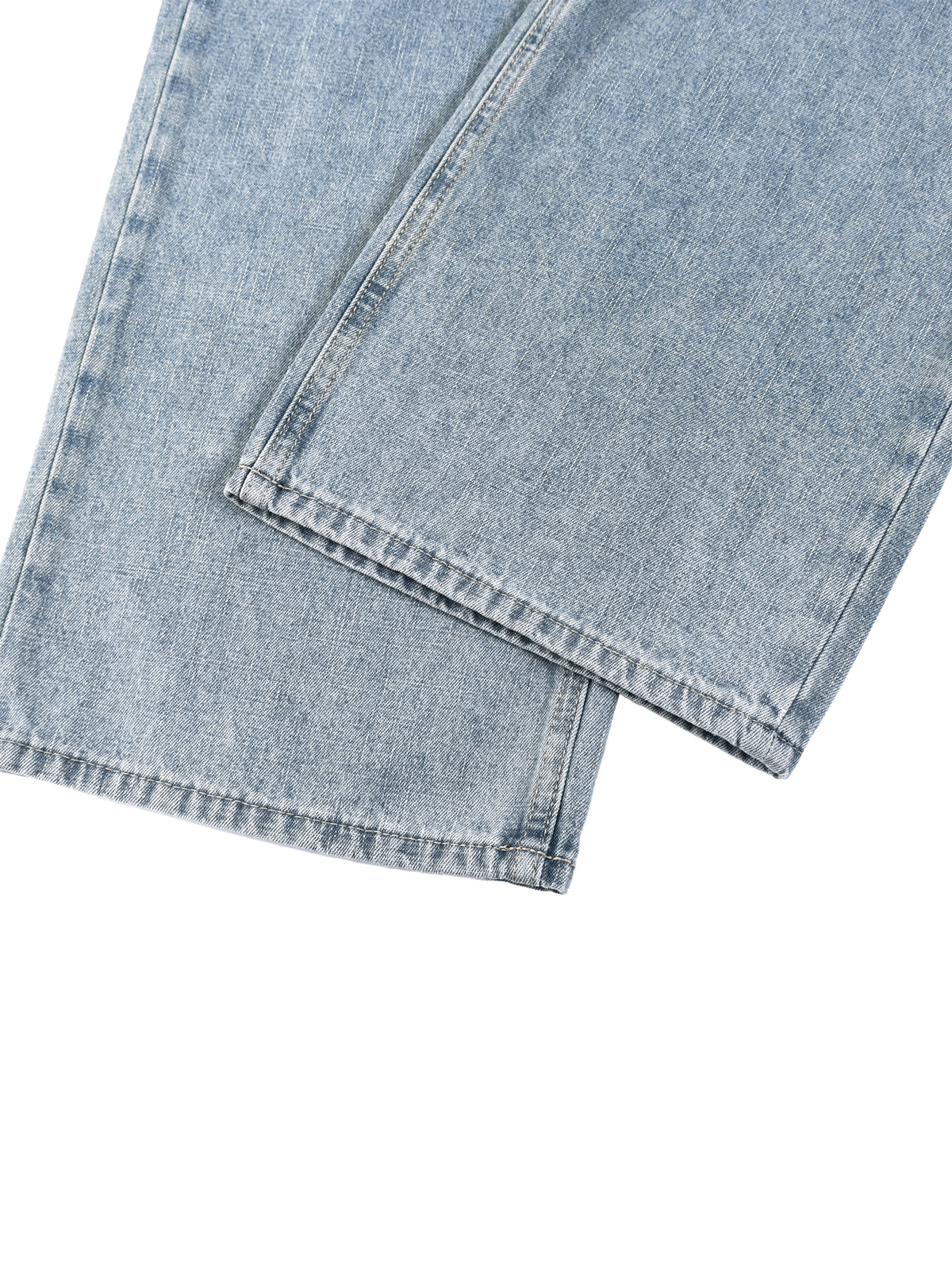Light blue denim fabric on a white background