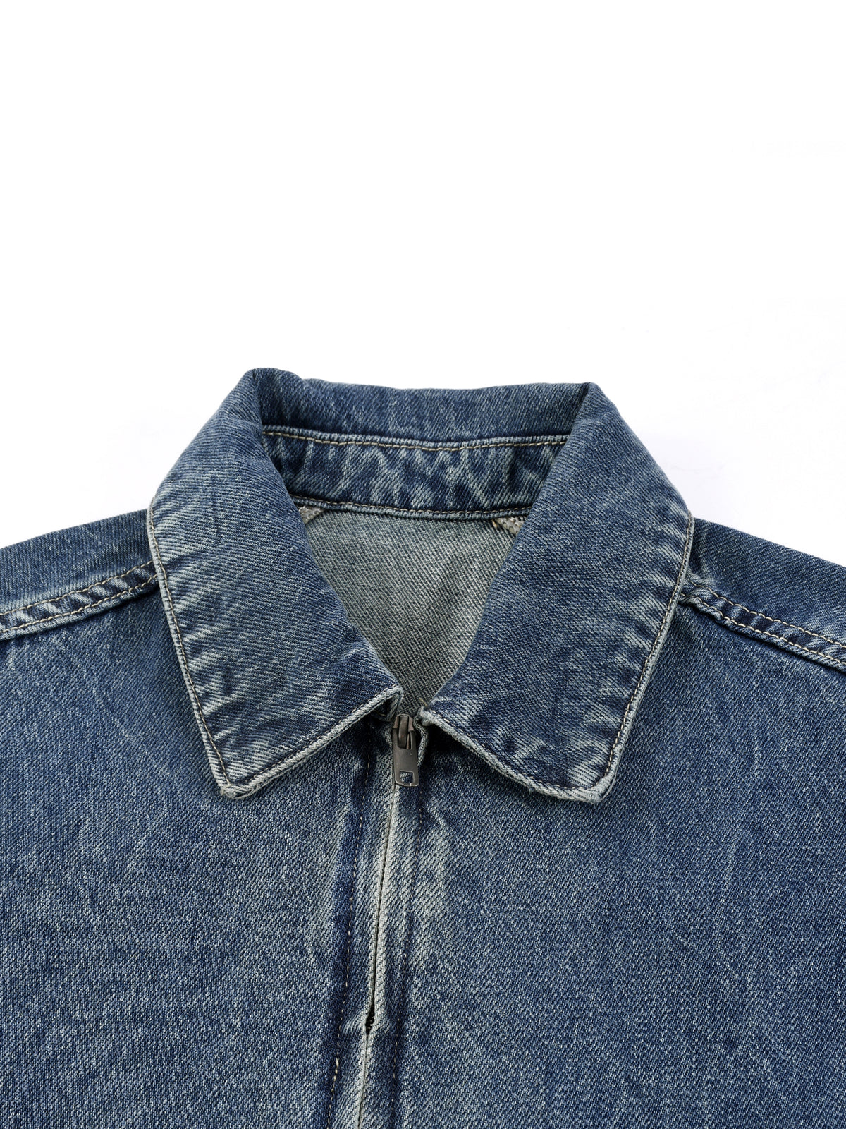 Blue denim jacket with collar on a white background