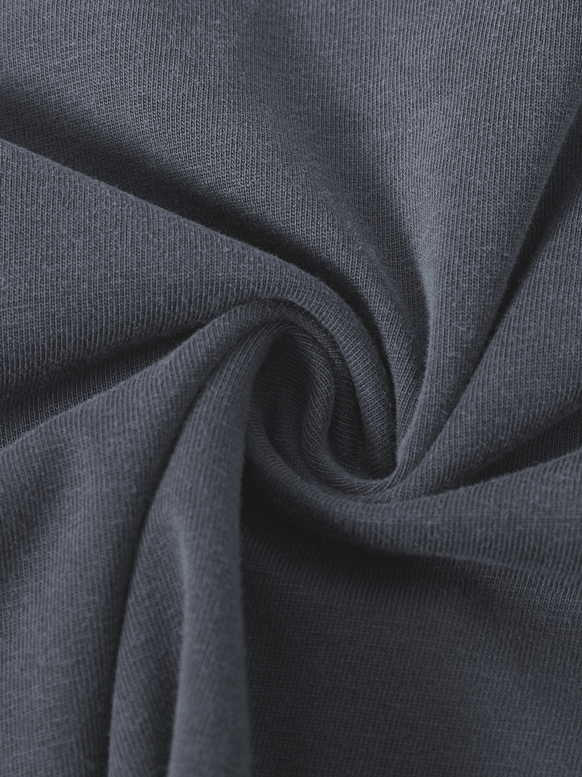 Close-up of dark gray fabric with a subtle texture