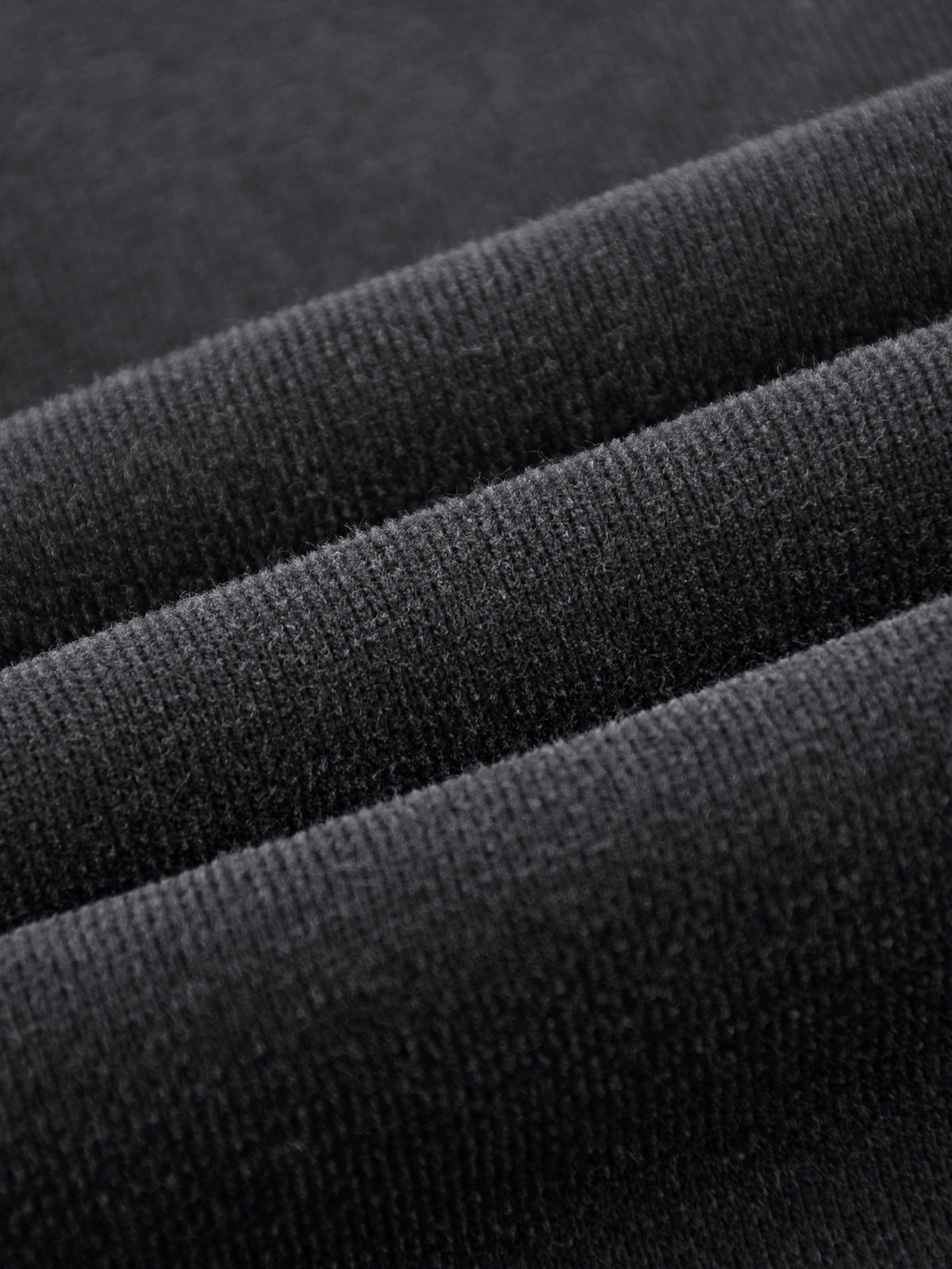 Close-up of black fabric with a textured pattern