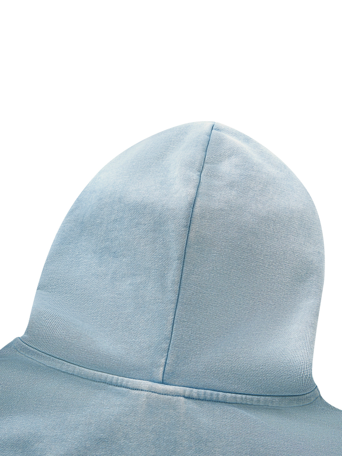 A close-up of a light blue suede or velvety fabric hood with a central seam, shown against a plain white background.