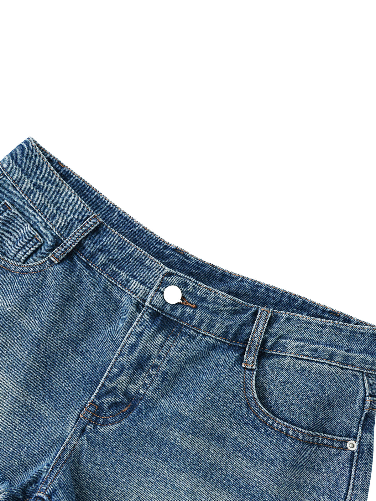 Close-up of blue denim shorts on a white background