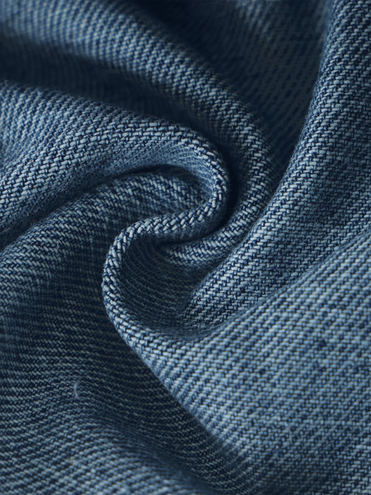 Close-up of blue fabric with a textured pattern